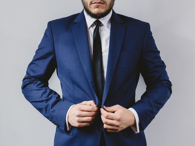 Suit portrait preparation wedding